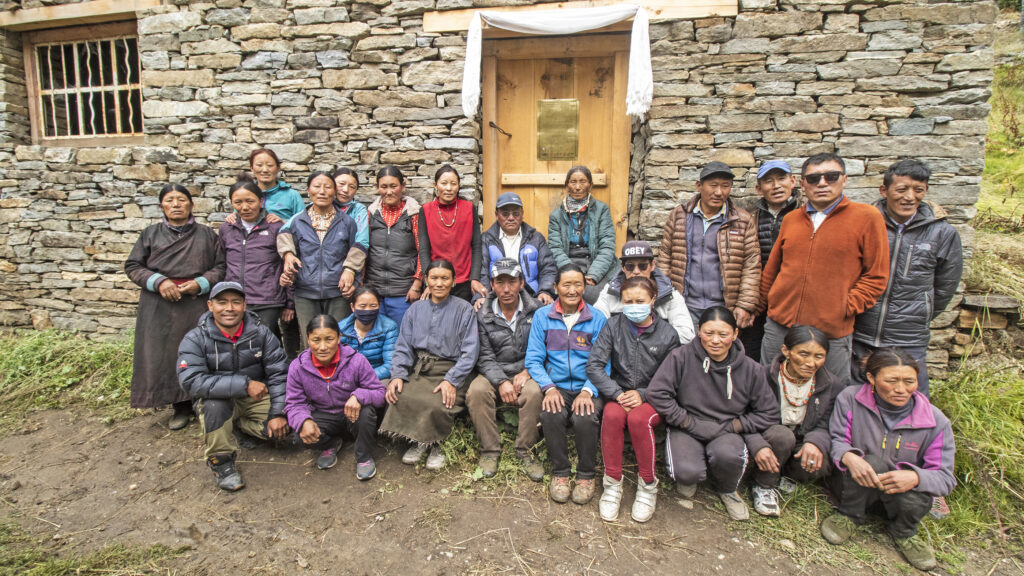 Villagers from Dzang outside the newly inaugurated communal predator-proof livestock corral.